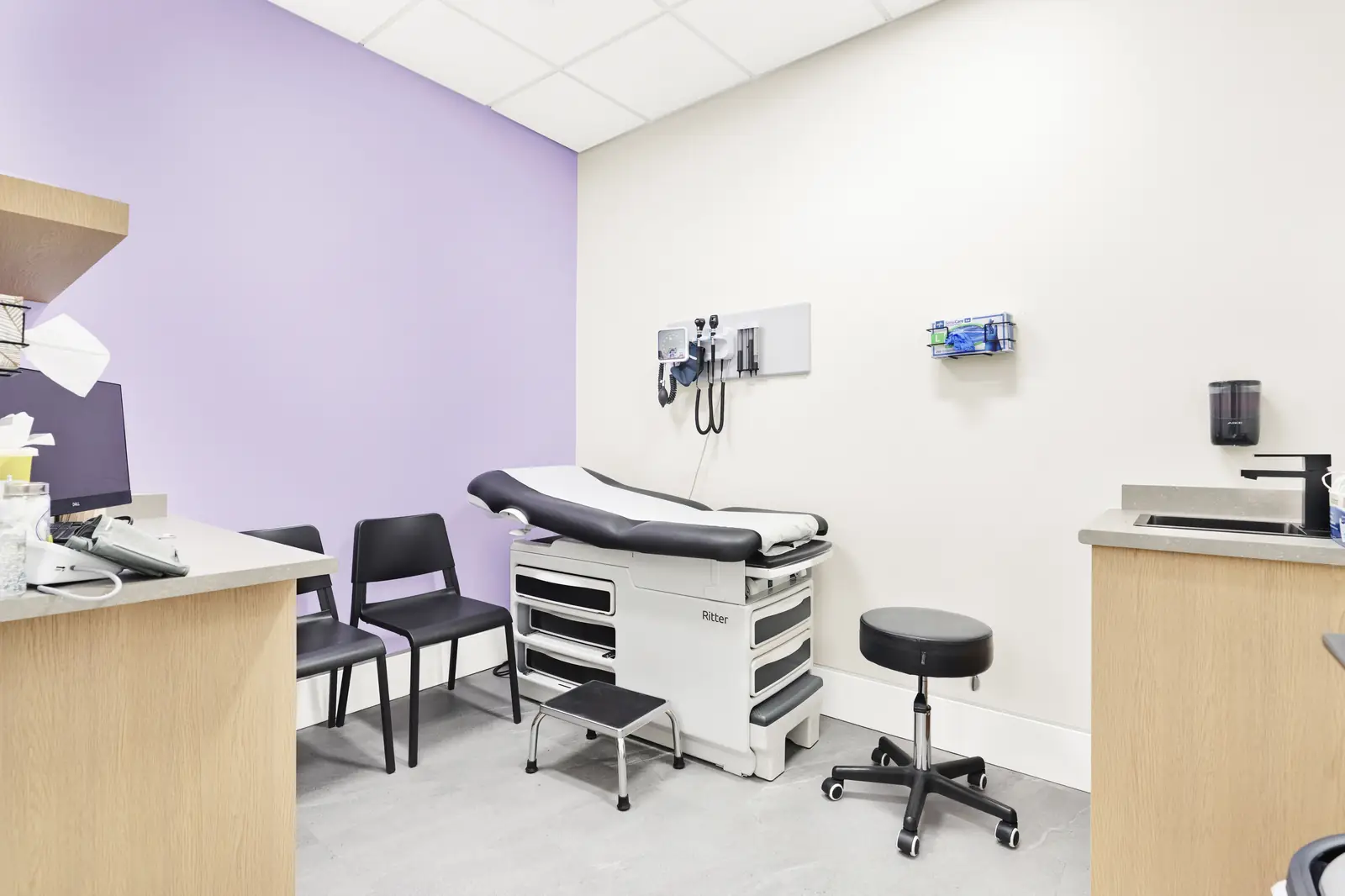 Exam room with examination table at Meadowridge Medical Clinic